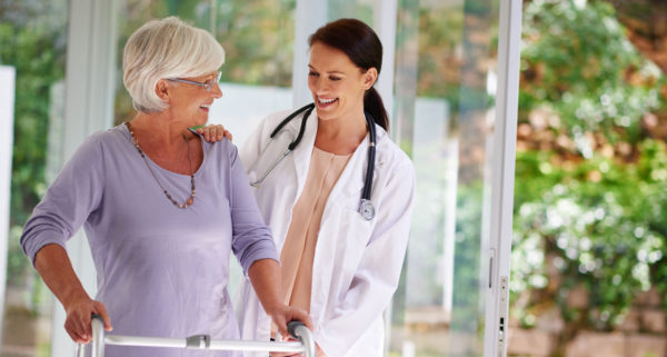 doctor with patient in rehabilitation